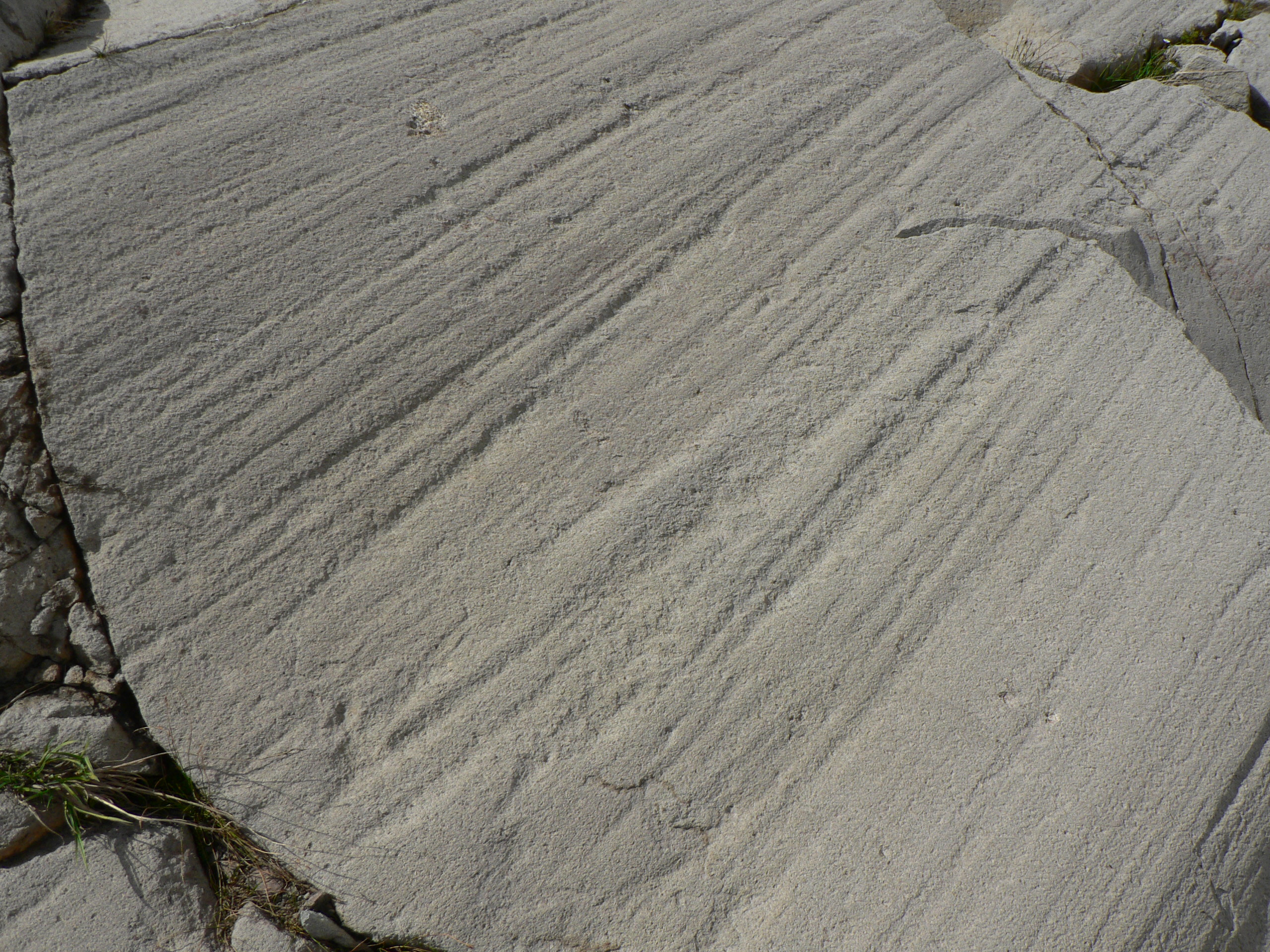 <p>Long scratches created where moraine scraped against resistant rock</p>
