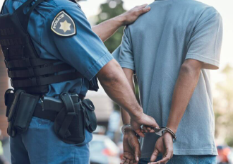 <p>Arrested - handcuffed </p>