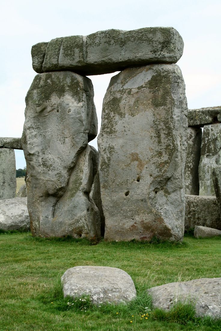 <p>two large vertical stones supporting a third horizontal laying stone on top (post and lintel)</p>