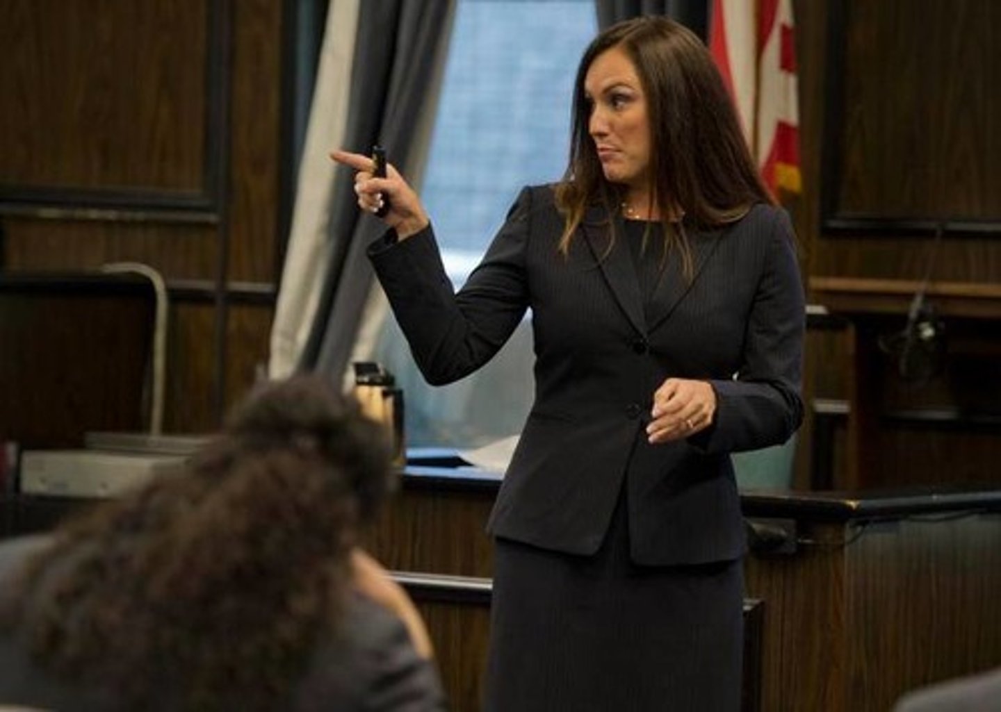 <p>the female prosecutor</p>