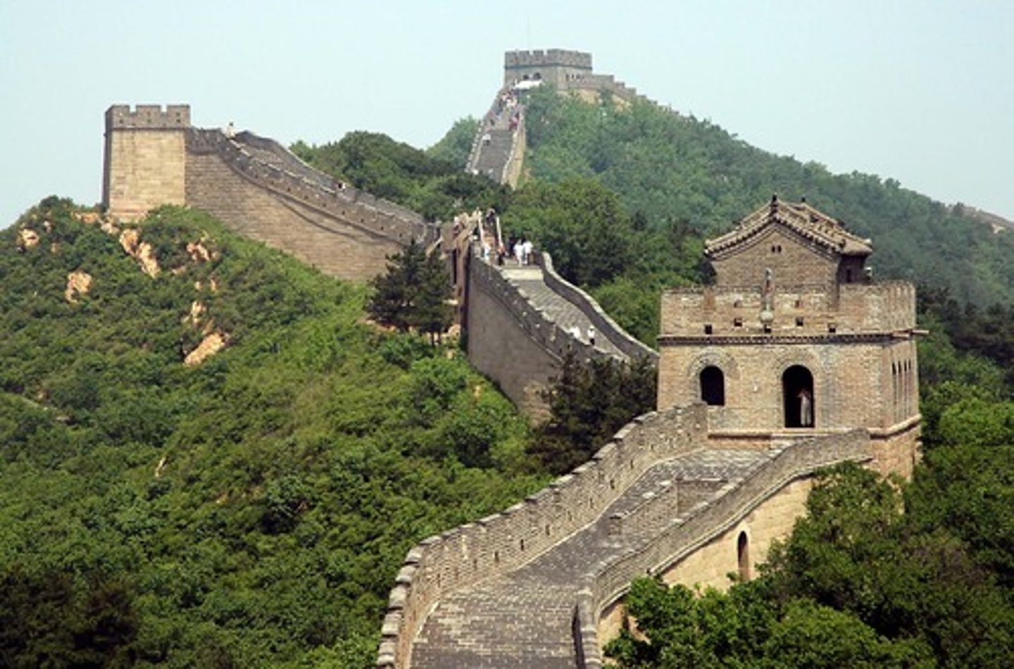 <p>barrier against enemies</p><p>210bce began, built over centuries</p><p>10,000 miles long</p><p>15-30' high</p><p>12-25' wide</p><p>Frequent watchtowers</p>