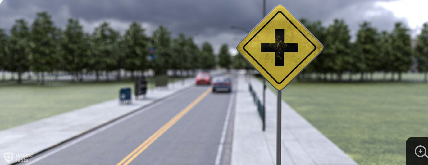 <p><strong>This sign indicates that you are approaching</strong></p><p>a divided highway.</p><p>a railroad crossing.</p><p>a hospital</p><p>a crossroad.</p><p></p>