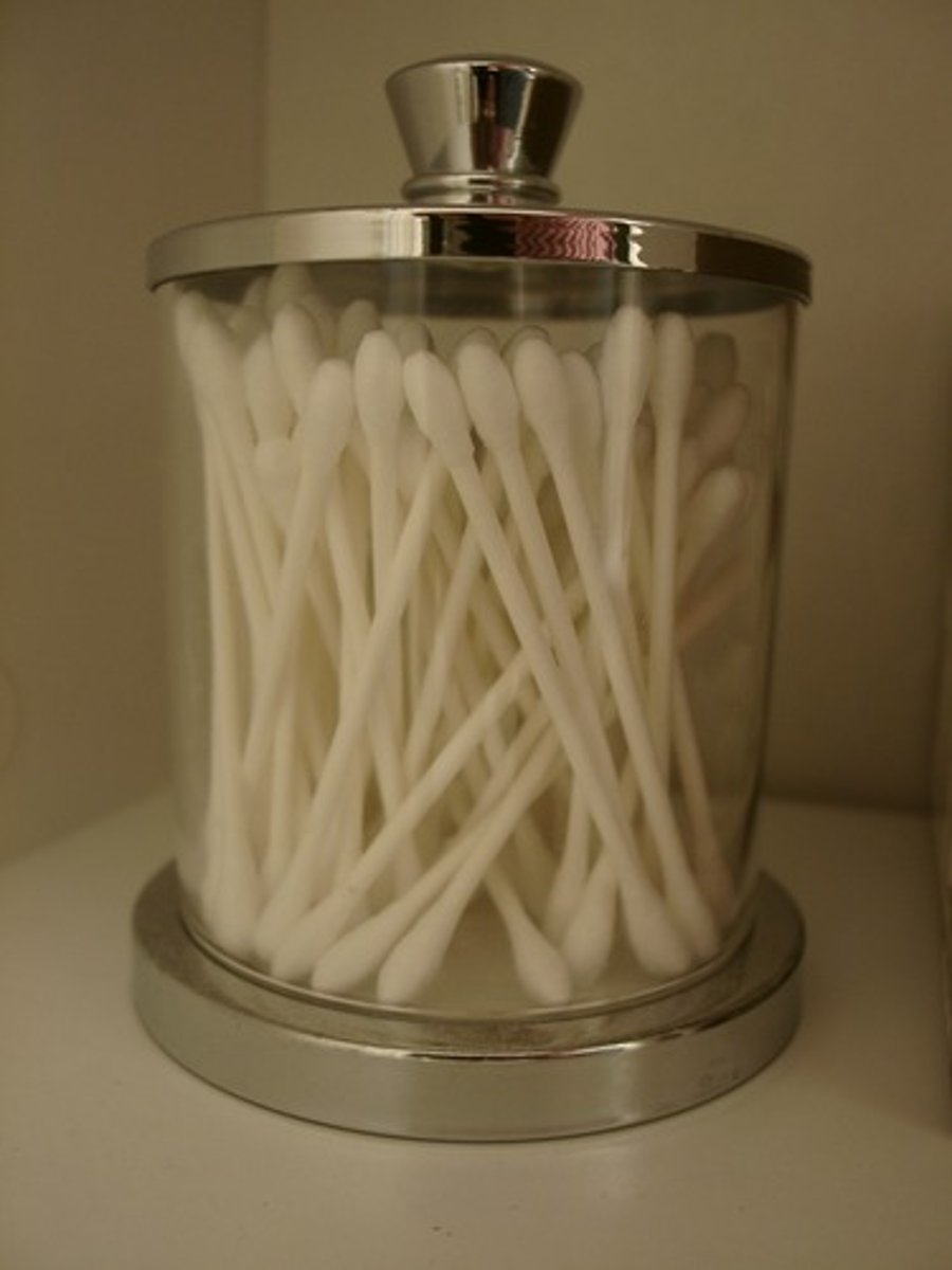 <p>Using swabs</p>