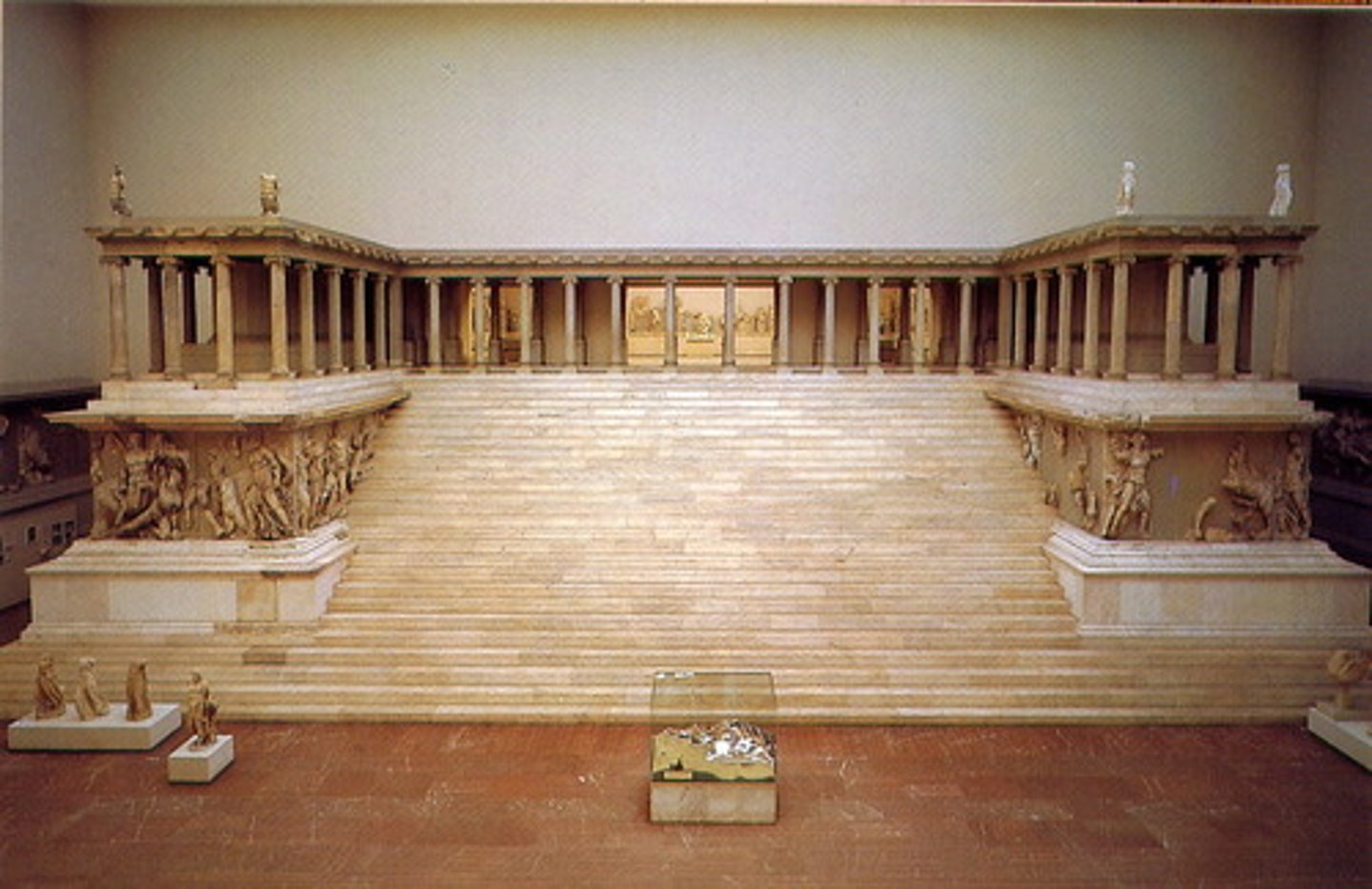 <p>- <span class="bgP">180-150 bce (high hellenistic pd)</span></p><p>- <span class="bgP">from pergamon/pergamum (asia minor)</span></p><p>- <span class="bgP">built by King Emends II</span></p><p>- built to mark successful victory over Gaul revolt; made to thank Zeus for victory</p><p>- reminiscent of Athenian Acropolis</p><p>- Ionic colonnade surrounded by friezes</p><p>- center has sacrificial altar</p>