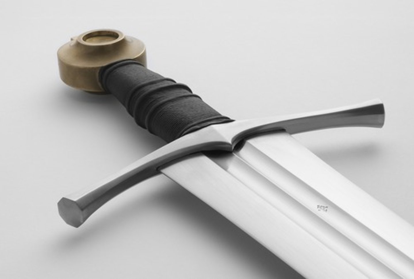 <p>(n.) a long metal weapon with a sharp point and edge</p>