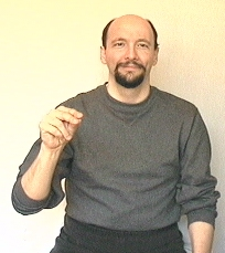<p><span>can use either a polite double motion or a more firm or definite single motion. three handshape closed</span></p>