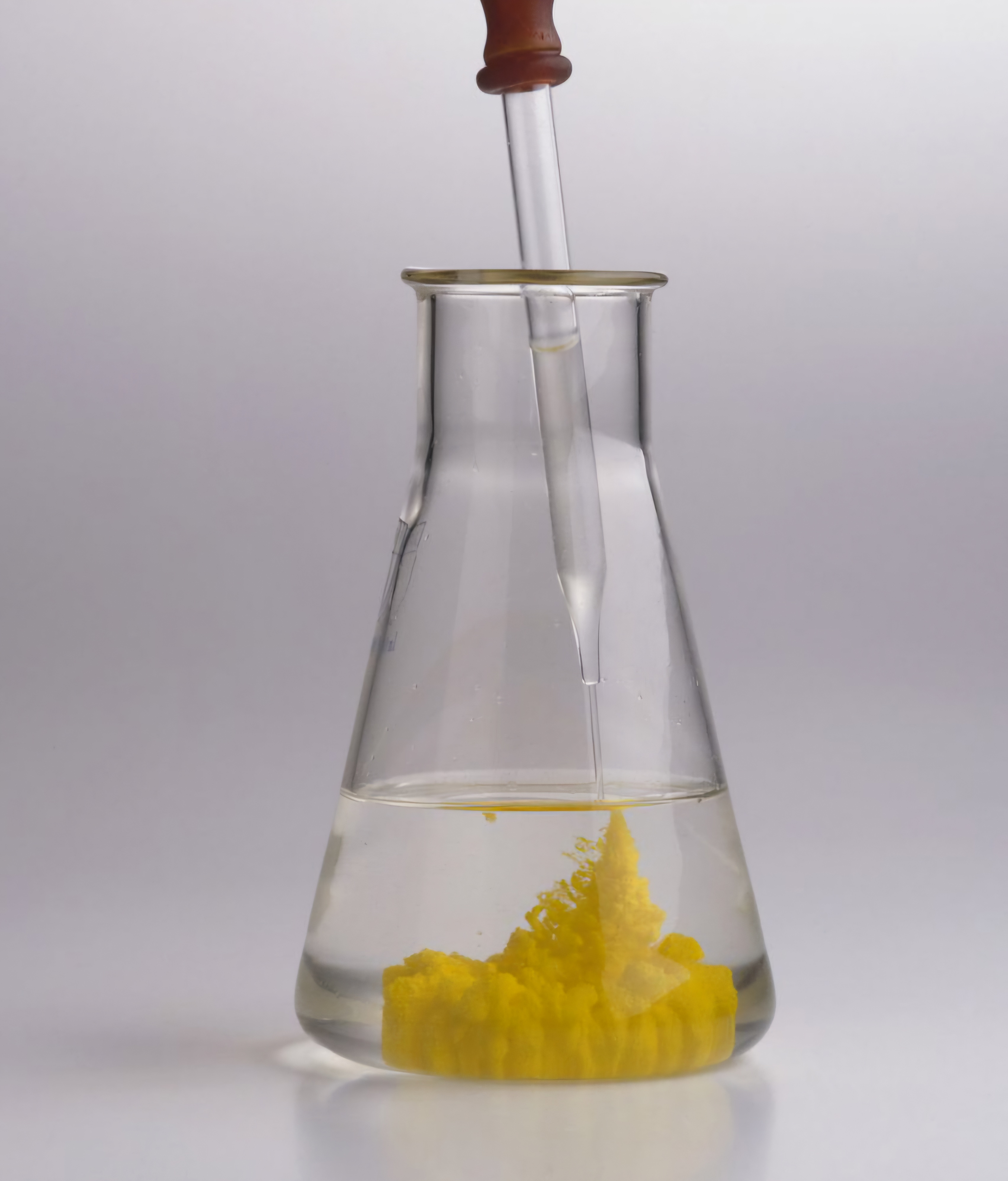 <p>The appearance of a yellow color and a precipitate upon mixing two clear liquids indicates a chemical change, as new substances are formed through a chemical reaction.</p>