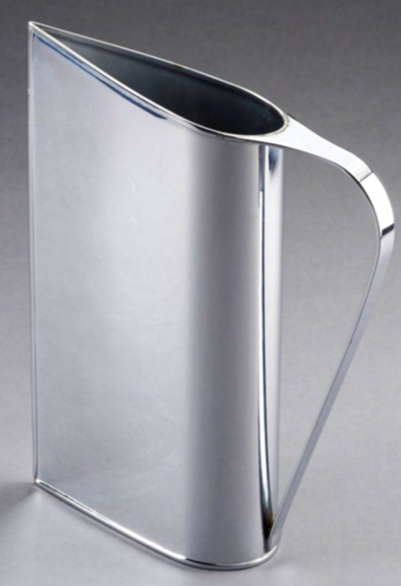<p>Peter Muller-Munk<br>1935<br>Inspired by the smokestacks on a shoreliner<br>chrome plated brass<br>hard to clean</p>