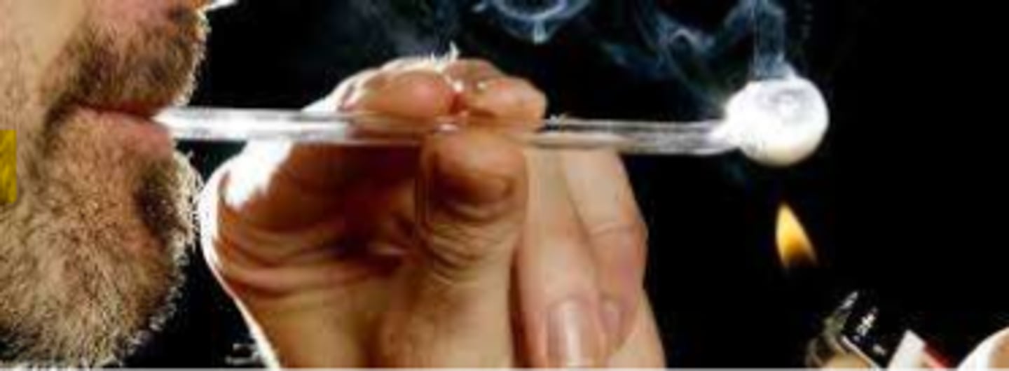 <p>- rock, inhaled (smoked)</p><p>- Cocaine hydrochloride + ammonia or baking soda + water = rock (alkalinized to get rock formation)</p><p>- heated to remove the hydrochloride ("freeing the base"), resulting in a solid, rock-like substance form</p><p>- even faster onset of action, danger of binging to maintain 'high'</p><p>- one use of crack cocaine does lead to addiction!</p>