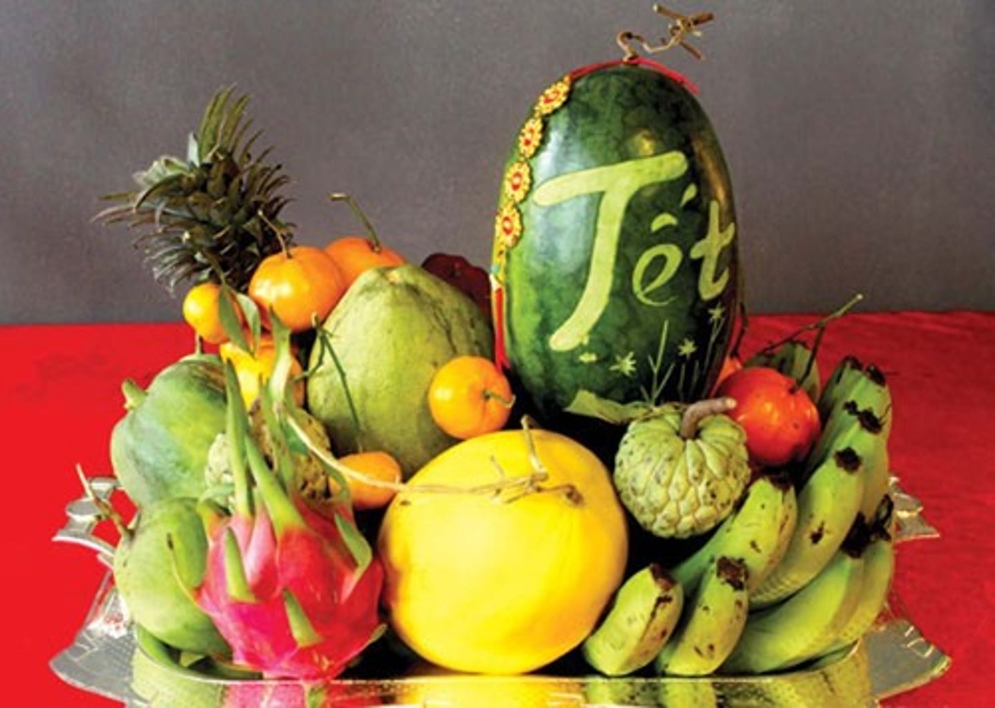 <p>np • /faɪv-fruːt treɪ/ • A traditional offering of five types of fruit, often seen during festivals in Vietnam. • Mâm ngũ quả • "The five-fruit tray is displayed during Tet celebrations."</p>