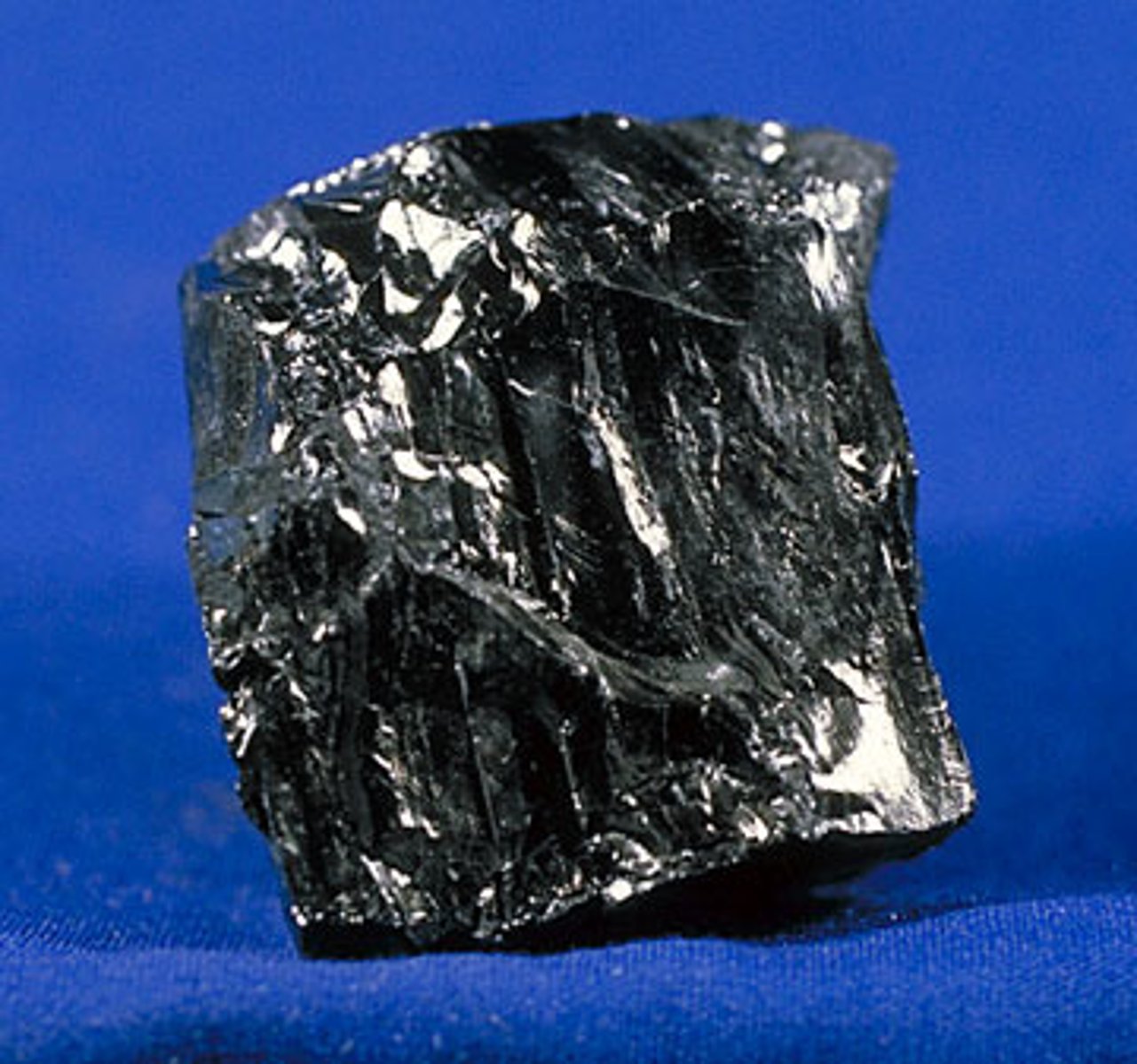 <p>a metamorphic coal with a high carbon content, high density, and black, shiny appearance</p>