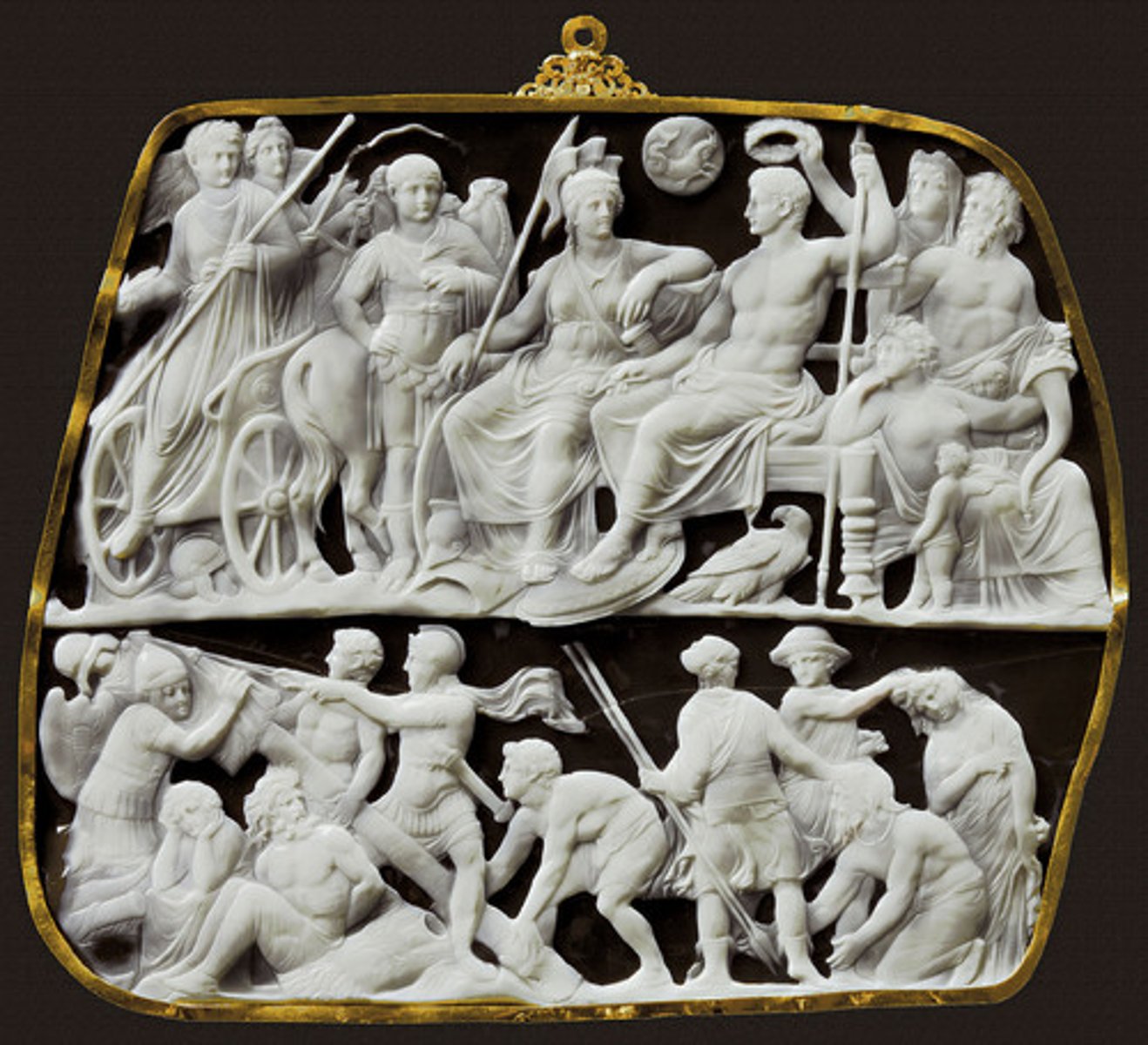 <p>large cameo. Augustus portrayed as Jupiter, seated next to the goddess Roma, the lower scene depicts Roman soldiers erecting a war trophy in the presence of captured barbarians</p>