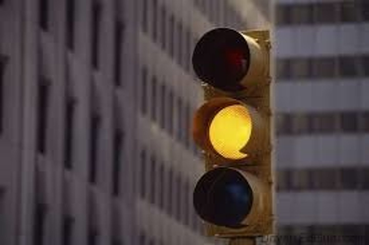 <p>USE CAUTION. The signal is transitioning from green to red. SLOW DOWN AND PREPARE TO STOP.</p>