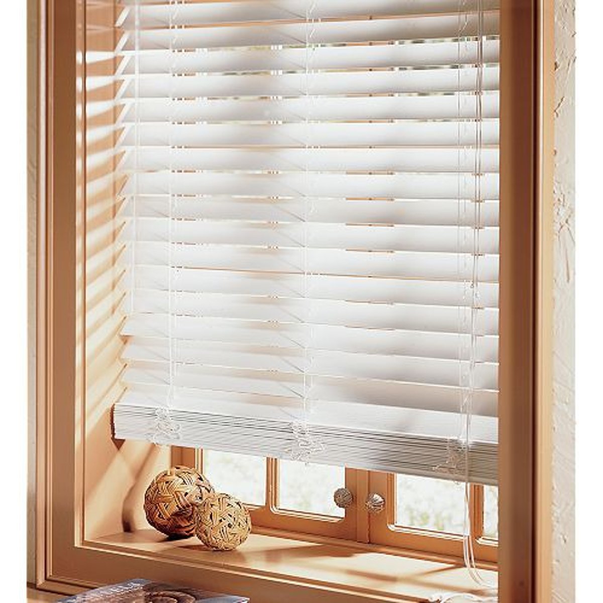 <p>window coverings made of a series of evenly spaced slats that may be opened or closed by a cord</p>