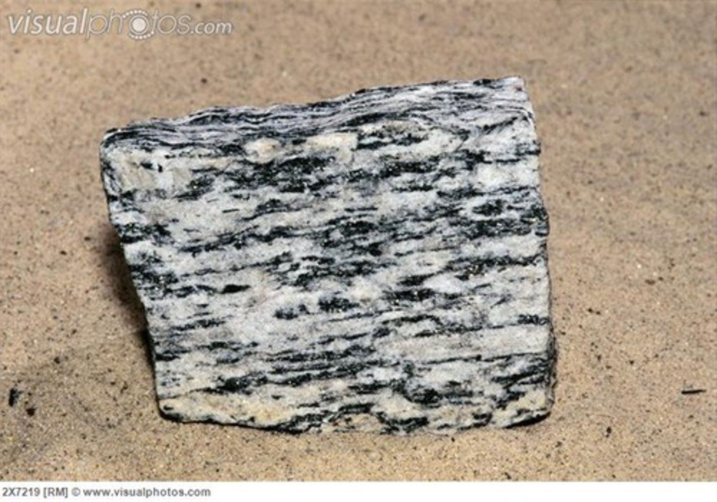 <p>metamorphic foliated rock formed from granite</p>
