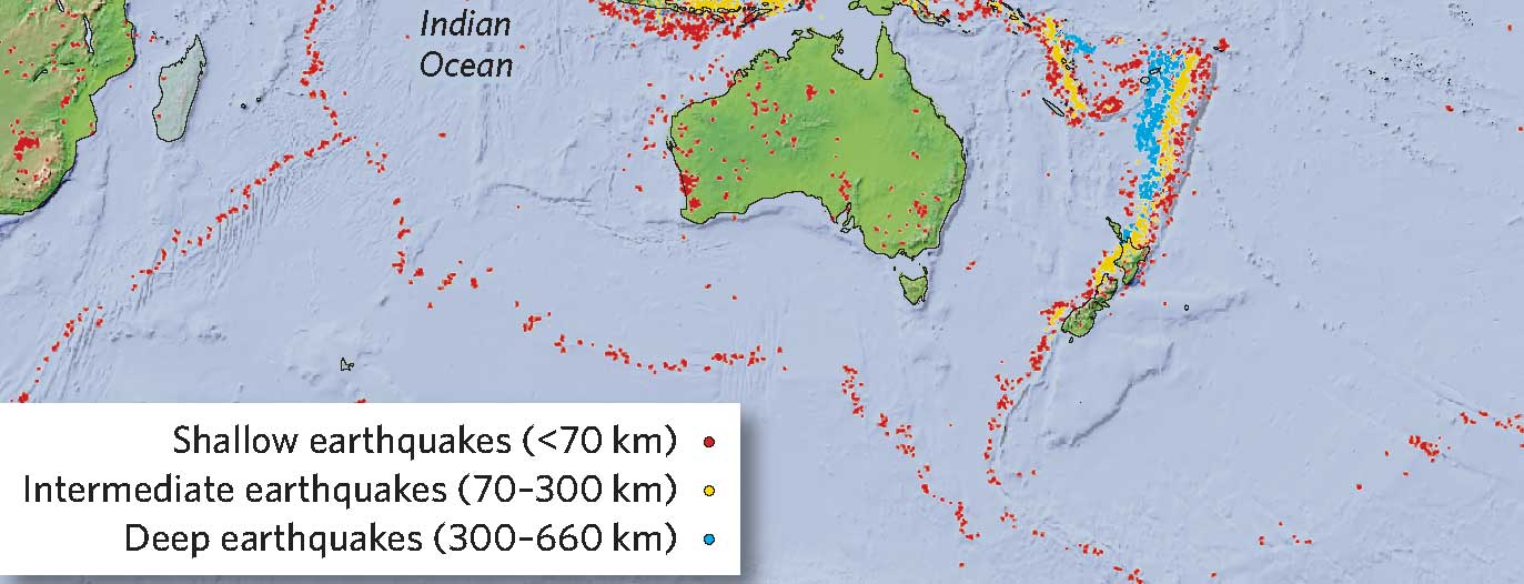 The earthquake foci pattern east of Australia and just north of New Zealand indicates which tectonic setting?