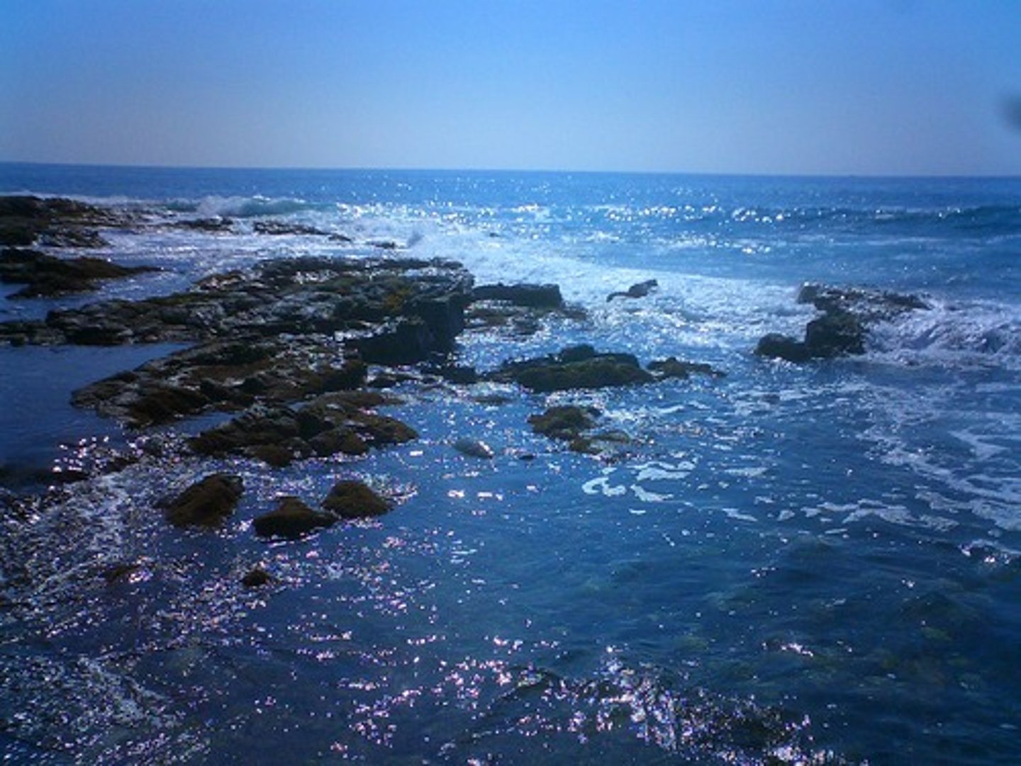 <p>the salty water that covers a large part of the surface of the earth, or a large area of salty water, smaller than an ocean, that is partly or completely surrounded by land</p>