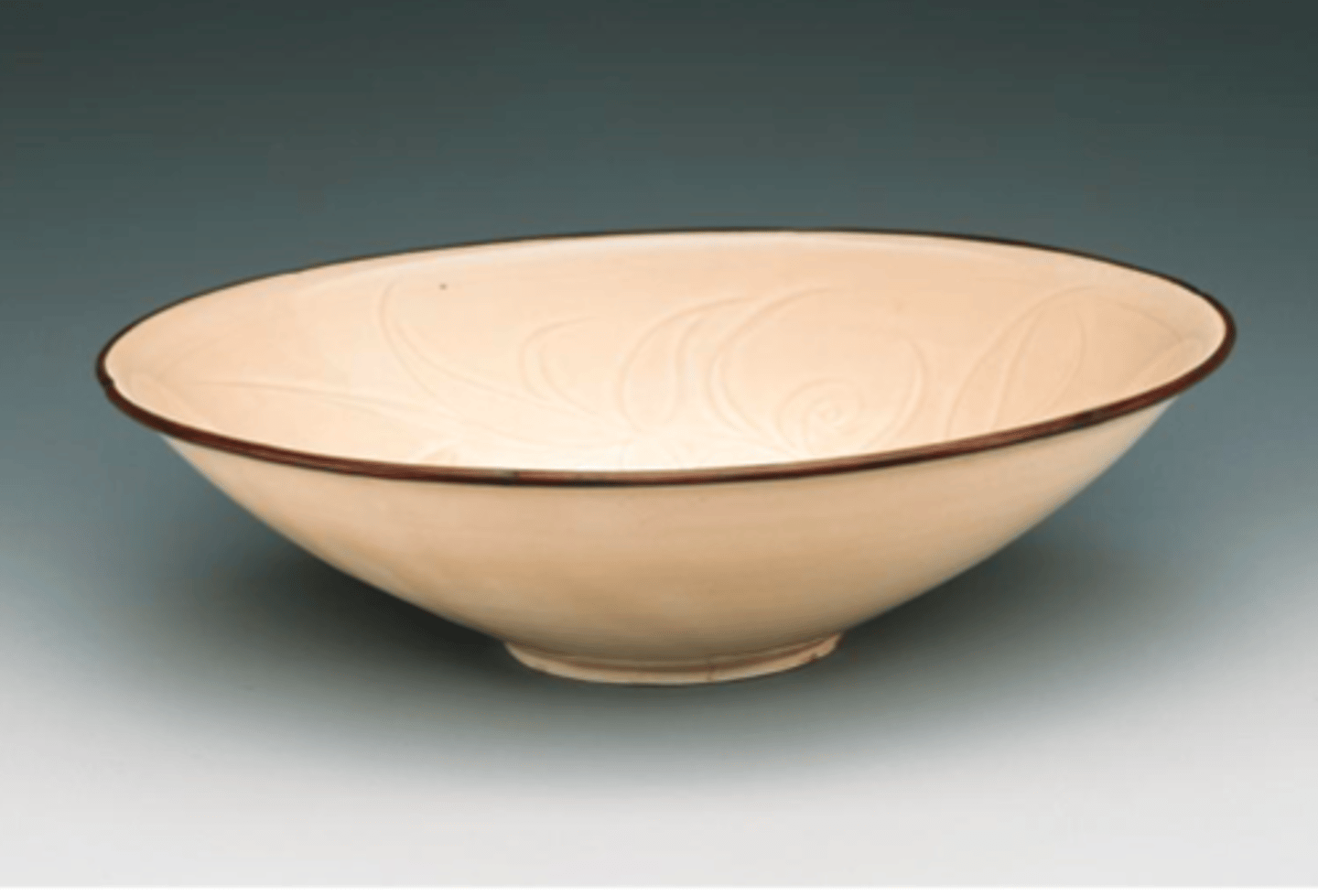 <p>is a mid to high fire clay that ranges from light gray to brown when fired. It is non porus, and it differs from porcelain in that it is more opaque.</p>
