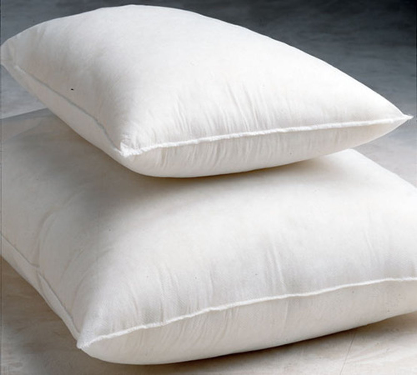 <p>a cushion to support the head of a sleeping person</p>