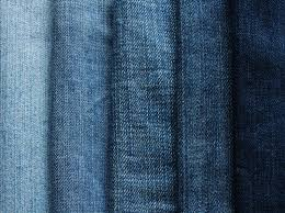 <p><strong>Denim</strong> /ˈden.ɪm/ =&gt;<em>I wear denim almost every day. It's durable, comfortable, and never goes out of style.</em></p>