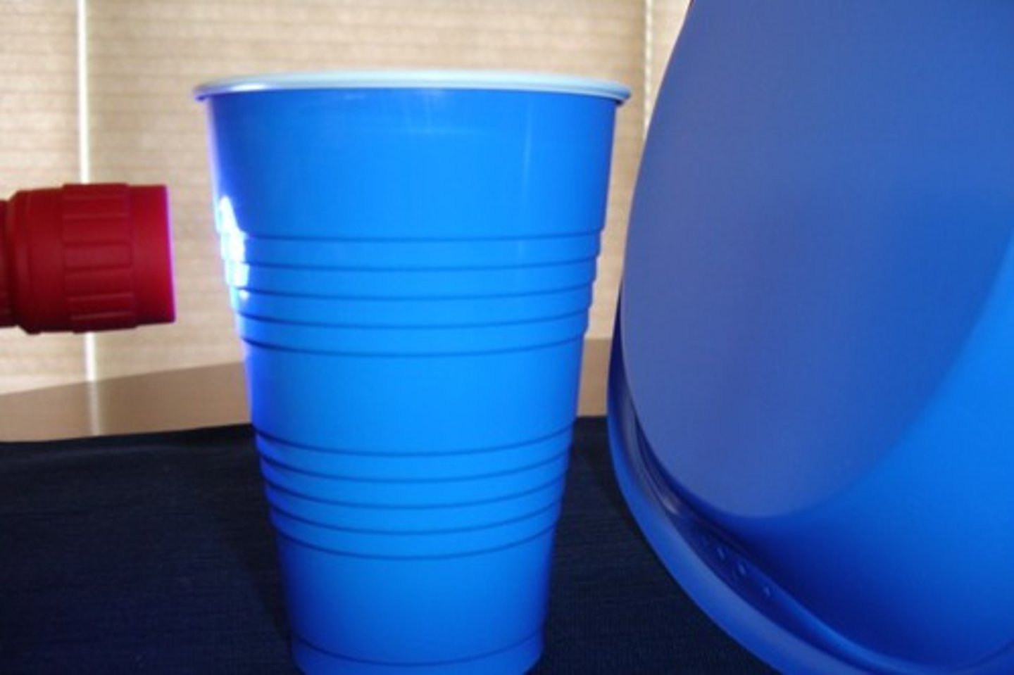 <p>A material or substance that allows no light to pass through.</p>