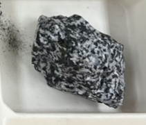 <p>Origin: intrusive </p><p>Texture: phaneritic</p><p>Color: intermediate&nbsp;</p><p>Cooling rate:slow&nbsp;</p><p>Special : Oreo</p>