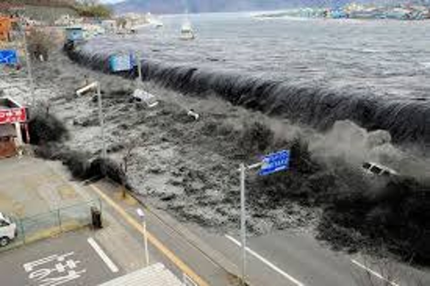 <p>A series of waves created when a body of water is rapidly displaced usually be an earthquake.</p><p>e.g. Tōhoku, Japan Earthquake and Tsunami 2011 (also led to nuclear meltdown at Fukushima)</p>