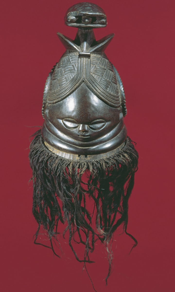 <p>Text: Sowei Mask, Sherbro District, 1886, Sierra Leone.</p><p>Used for initiation of young girls into society. Represents the ideal female beauty.</p>