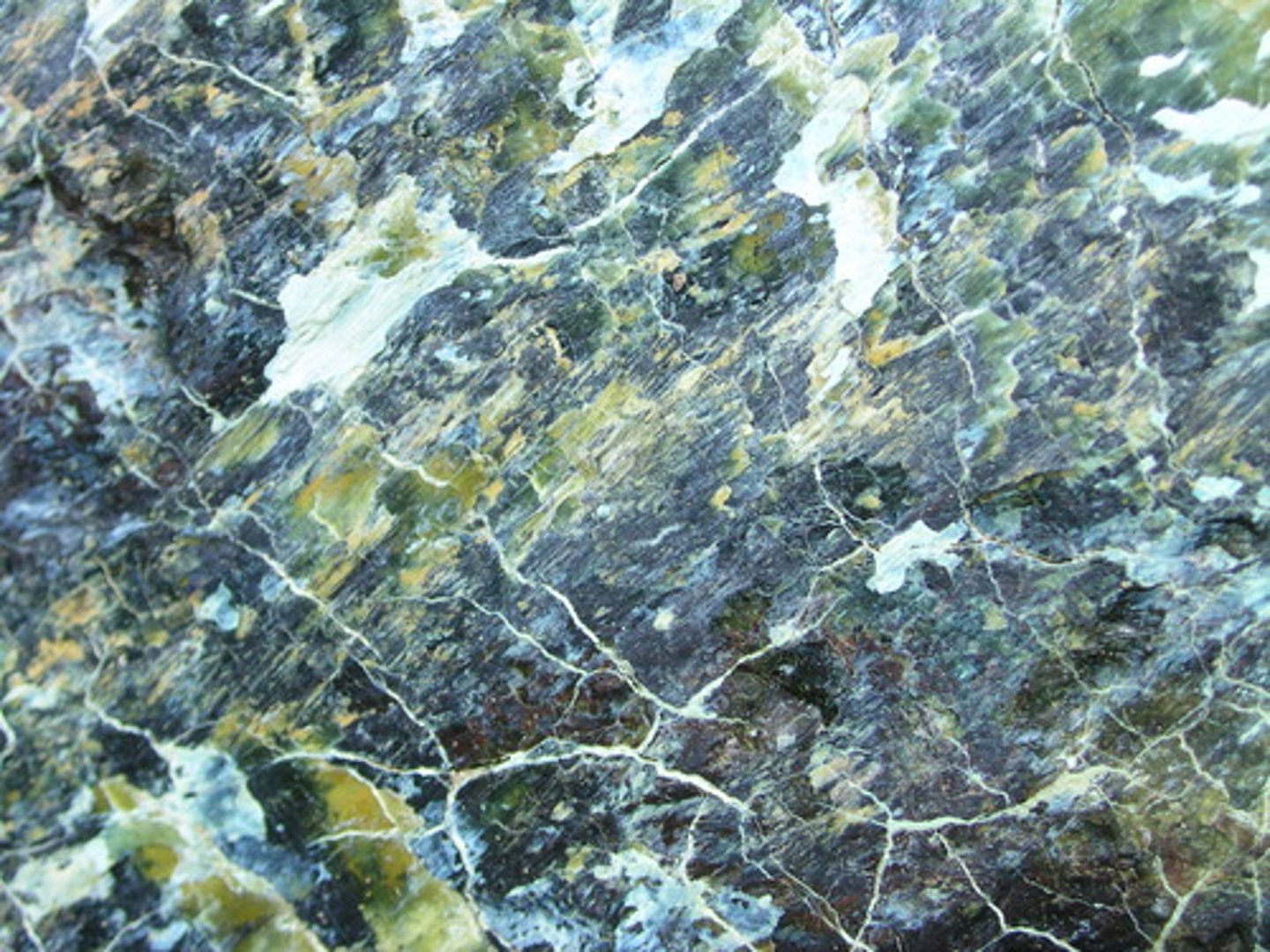 <p>Metamorphic Rock<br>Color:<br>Streak:<br>Luster:<br>Cleavage:<br>Hardness:<br>Specific Gravity:</p>
