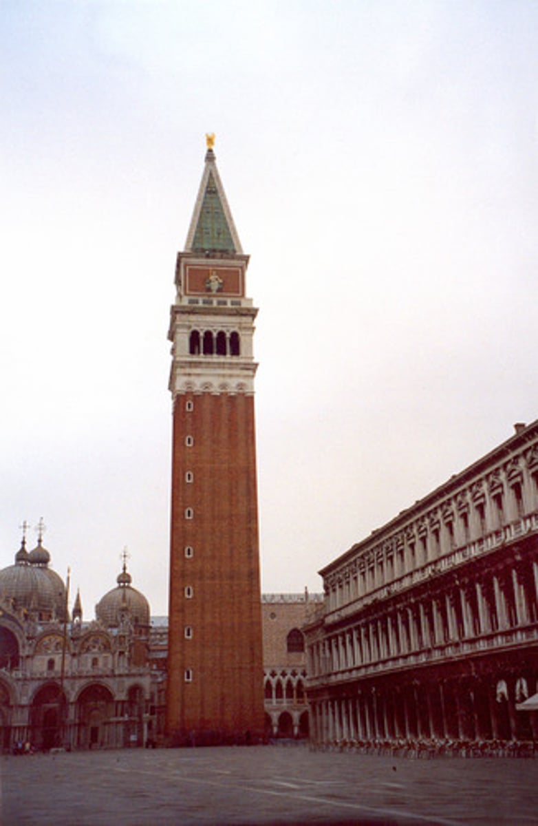 <p>a bell tower of an Italian building</p>