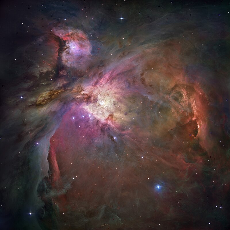 The **Orion Nebula.**

This **emission nebula** contains glowing gas that has been excited by newly-formed stars and emits light by fluorescence.