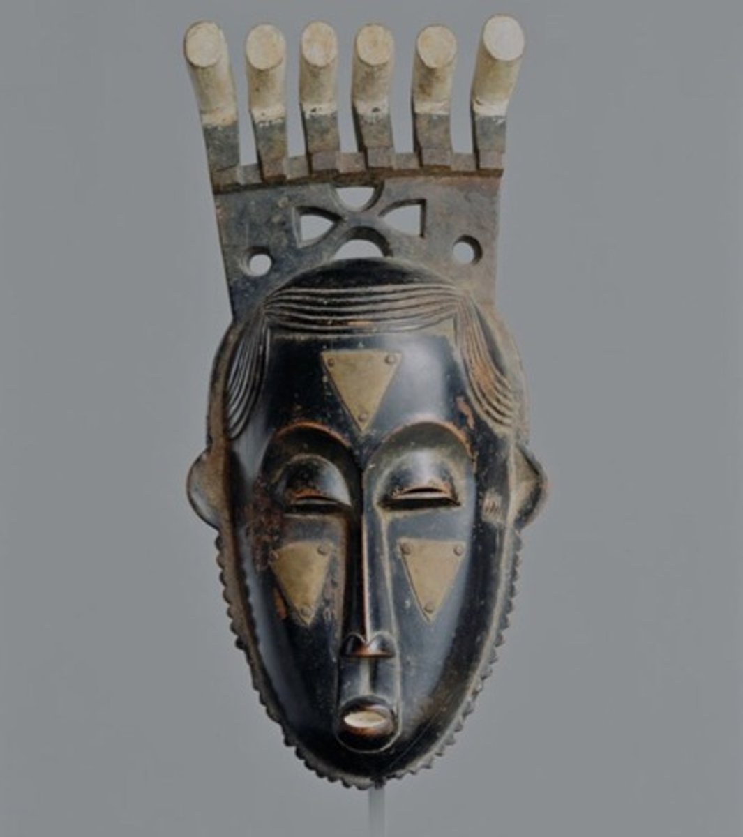 <p>Owie Kimou, Baule Peoples</p><p>Ivory Coast</p><p>wood and pigment</p><p>secular masquerade</p><p>(Moya Yanso's likeness, commissioned and og worn by Kousame Ziarey)</p>