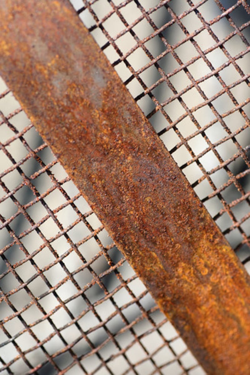 <p>A chemical weathering process where iron combines with oxygen when water is present and creates rust.</p>