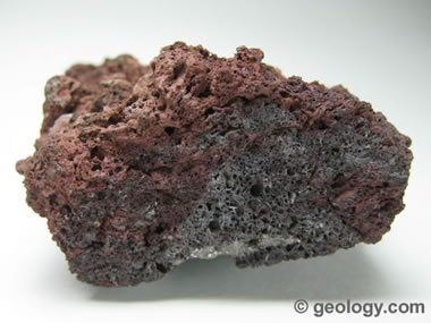 <p>Dark-colored <strong>igneous rock</strong> with abundant round bubble-like cavities known as vesicles. It ranges in color from black or dark gray to deep reddish brown. Scoria usually has a composition similar to <strong>basalt</strong>, but it can also have a composition similar to <strong>andesite</strong></p>