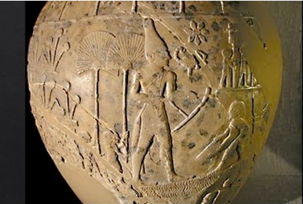 <ul><li><p>A <strong>mace head from the cemetery at nekhen</strong></p></li><li><p>The <strong>king is wearing a white domed crown for upper Egypt and other regalia for later dynastic kingship</strong></p></li><li><p>ex.</p><ul><li><p>A<strong> bull's tail </strong>hangs from the belt which is a symbol of <strong>authority</strong></p></li><li><p>Shepherds shem set</p><ul><li><p>AKA <strong>apron</strong></p></li></ul></li><li><p><strong>Goat beard</strong></p><ul><li><p>Probably false</p></li></ul></li><li><p>He is carrying the t<strong>ool that opens the irrigation canal</strong></p><ul><li><p>So signifies <strong>power</strong></p></li></ul></li><li><p>The <strong>rosette </strong>which is a symbol of <strong>divinity</strong></p></li><li><p><strong>Scorpion which alludes to his name</strong></p></li></ul></li></ul><p></p>