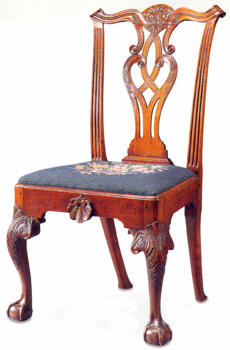 <p>A version of the Queen Anne chair with pierced splat and squared top rail.</p>