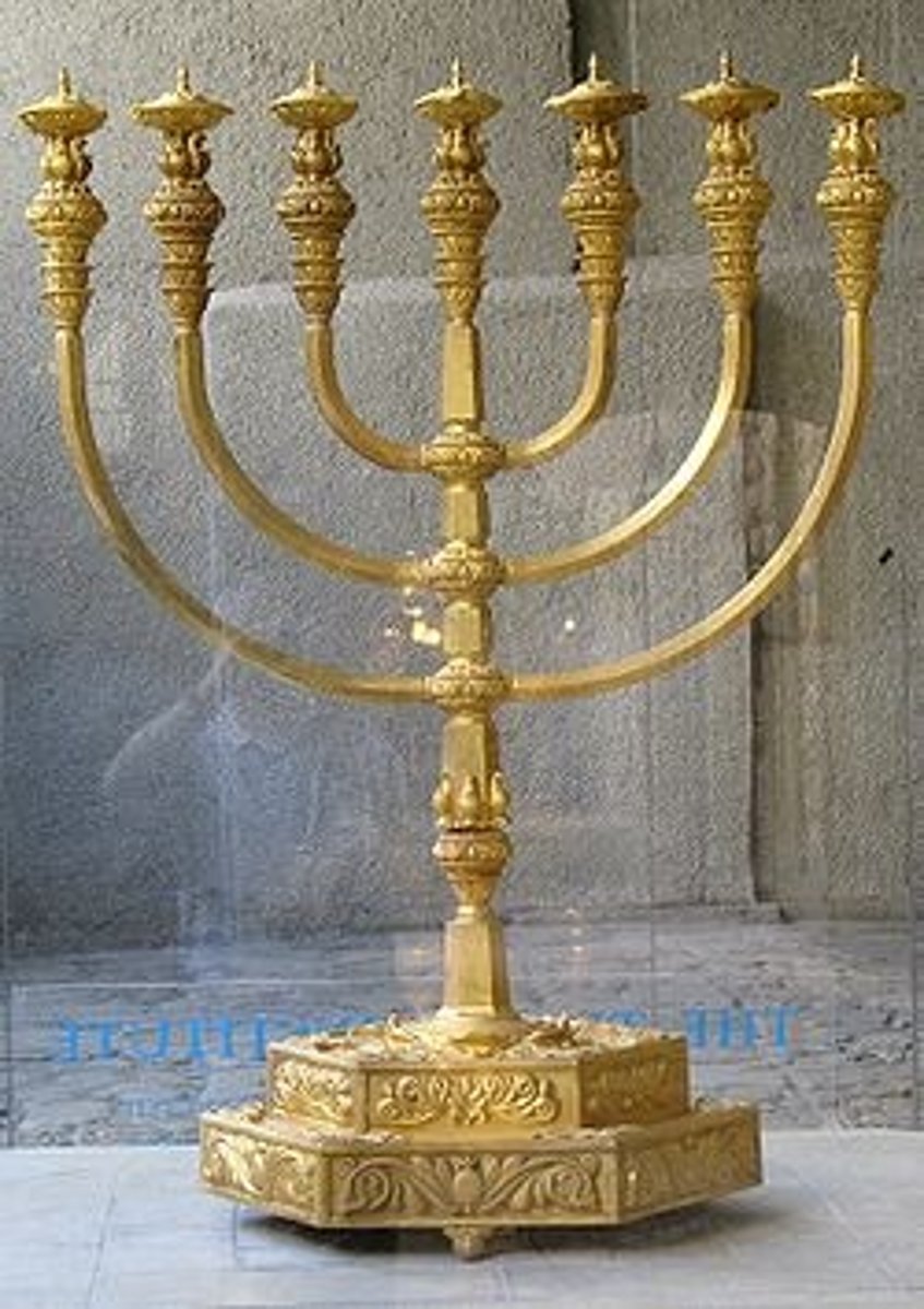<p>A candelabrum with a central stem bearing seven candles. The oldest symbol in Judaism.</p><p>-created in wilderness of exodus and later transfered to solomon temple in jerusalum.</p><p>-symbolic, 7 days of creation and tree of life</p><p>-9 branches is for hannukkah</p>