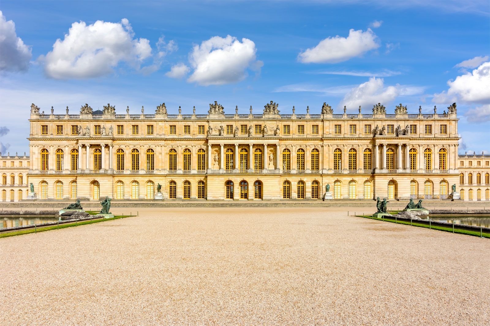 <p>A large royal residence built in the seventeenth century by King Louis XIV of France, near Paris. The palace, with its lavishgardens and fountains, is a spectacular example of French classical architecture. The Hall of Mirrors is particularly well known. The peace treaty that formally ended World War I was negotiated and signed here as well.</p>