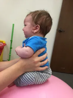 <p><strong>Middle Infancy, 4-6 mo: </strong>Labyrinthine Righting Reaction</p>