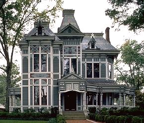 <p>Steeply pitched roofs. Plain or colorfully painted brick. Ornate gables. Painted iron railings. Churchlike rooftop finials. Sliding sash and canted bay windows. Octagonal or round towers and turrets to draw the eye upward. Two to three stories.</p>