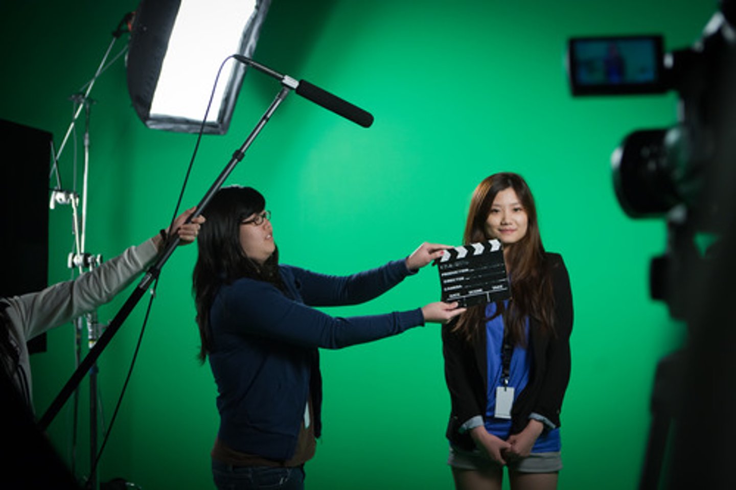 <p>filming of live actors against a blank and colored screen for subsequent compositing with digital elements.</p>