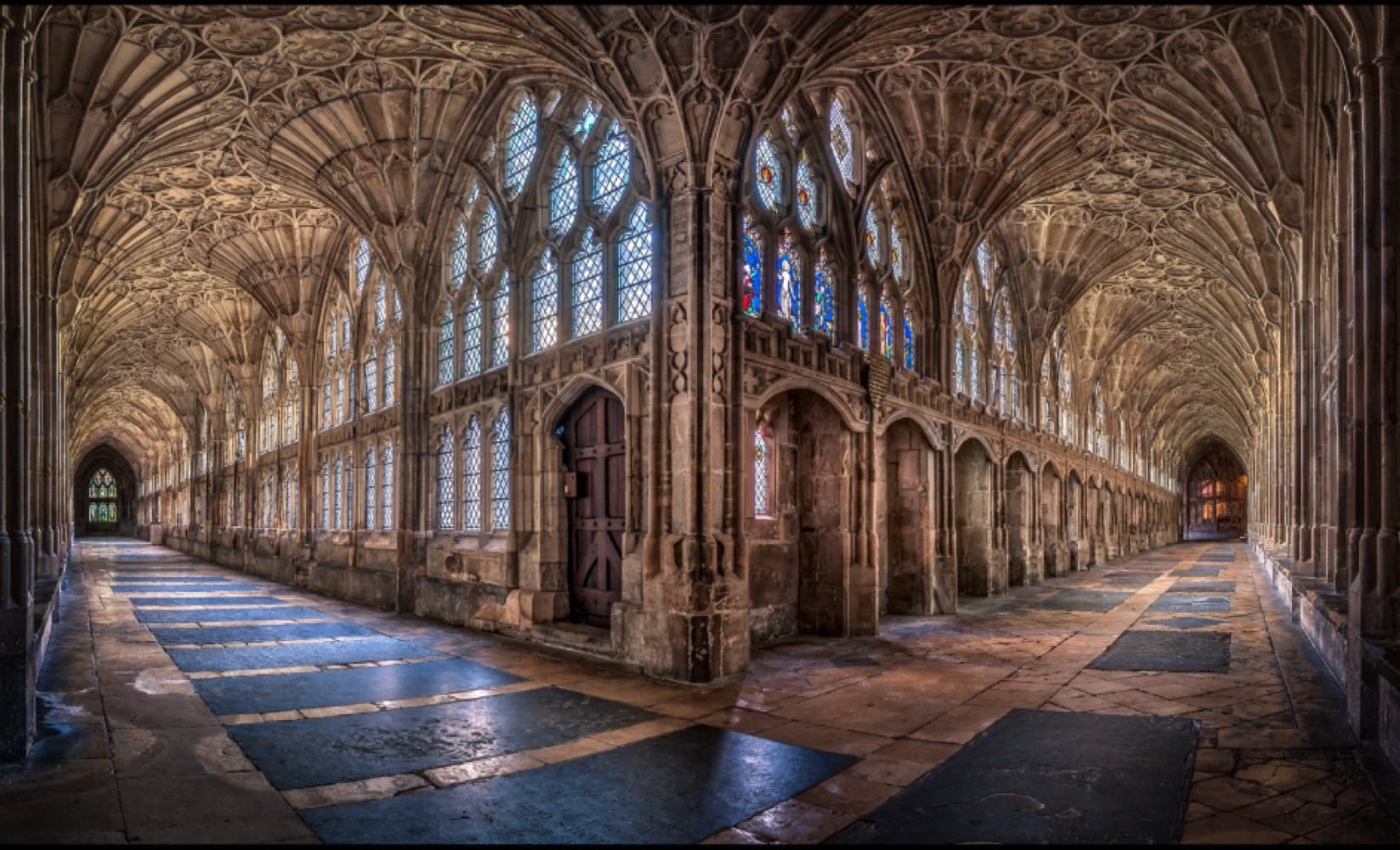 <p>describe the <span style="background-color: transparent;"><span>Gloucester Cathedral Cloister and its significance </span></span></p>