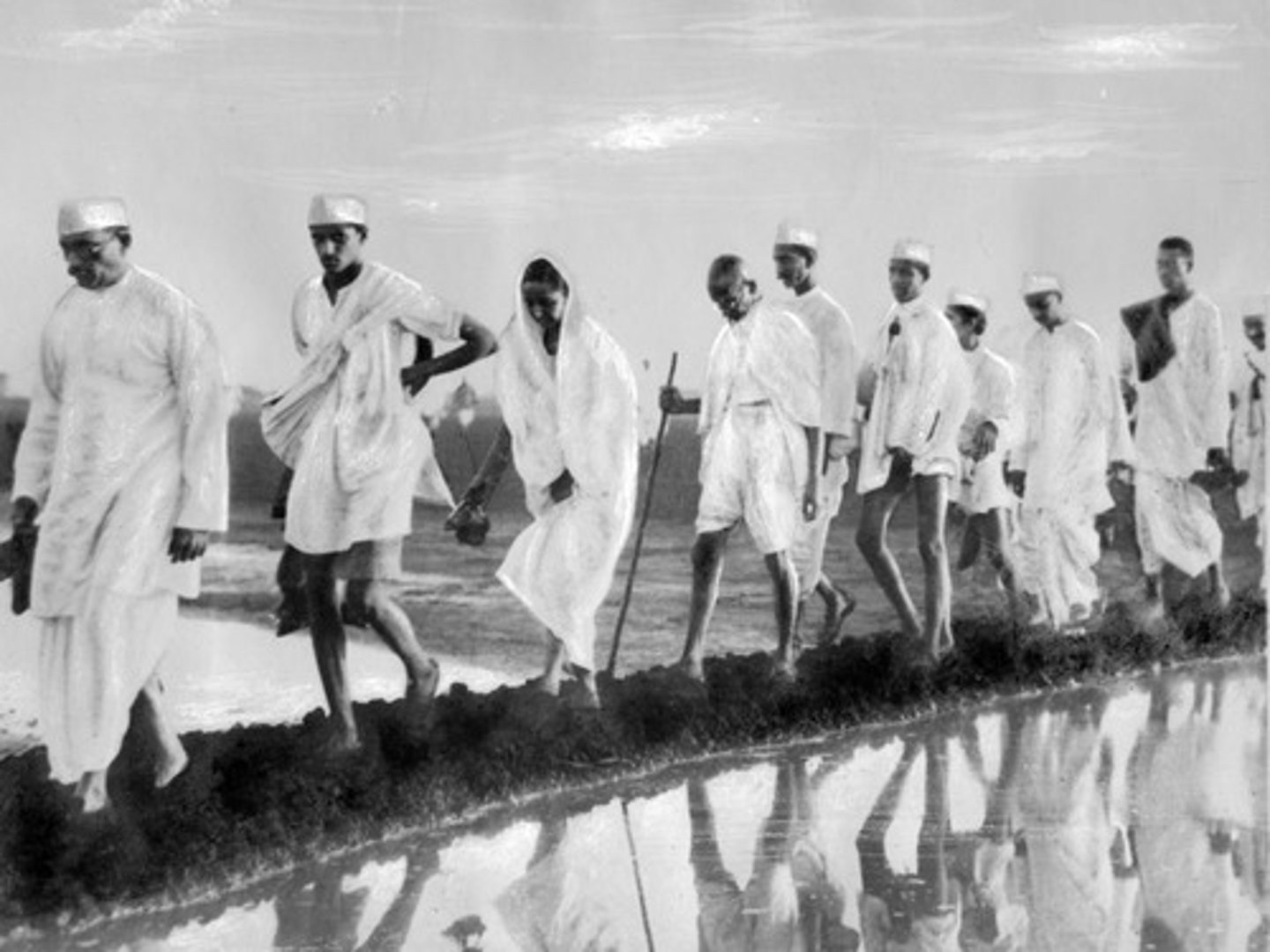 <p>Gandhi led a march to the sea in protest of the tax on essential salt. He collected a piece of natural salt, breaking the law and inspiring other Indians to perform the act of civil disobedience.</p><p>Significance: Created talk in London to ease regulations/control and proved the power of peaceful protest.</p>