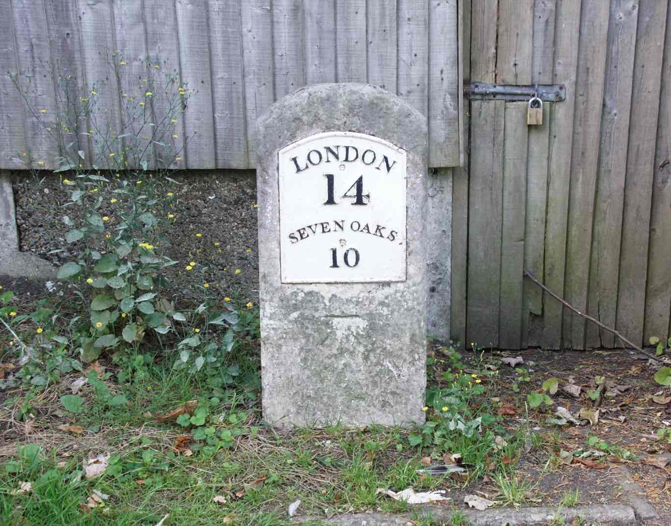 <p>A sign with the distance </p>