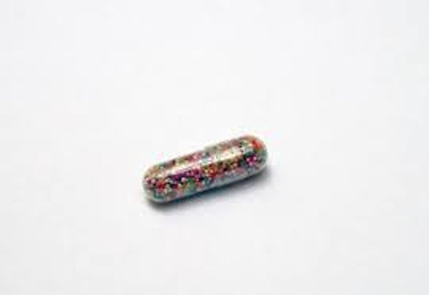 <p>a small container which has a measured amount of a medicine inside and which dissolves when you swallow it</p>