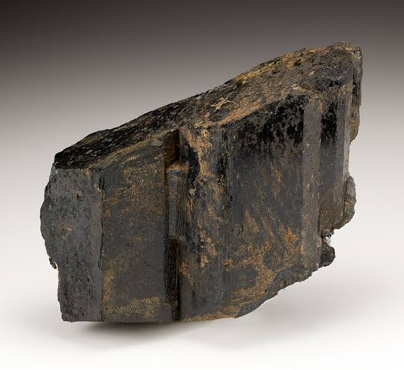 <p>Cleavage where the mineral breaks along two planes (also identify mineral)</p>