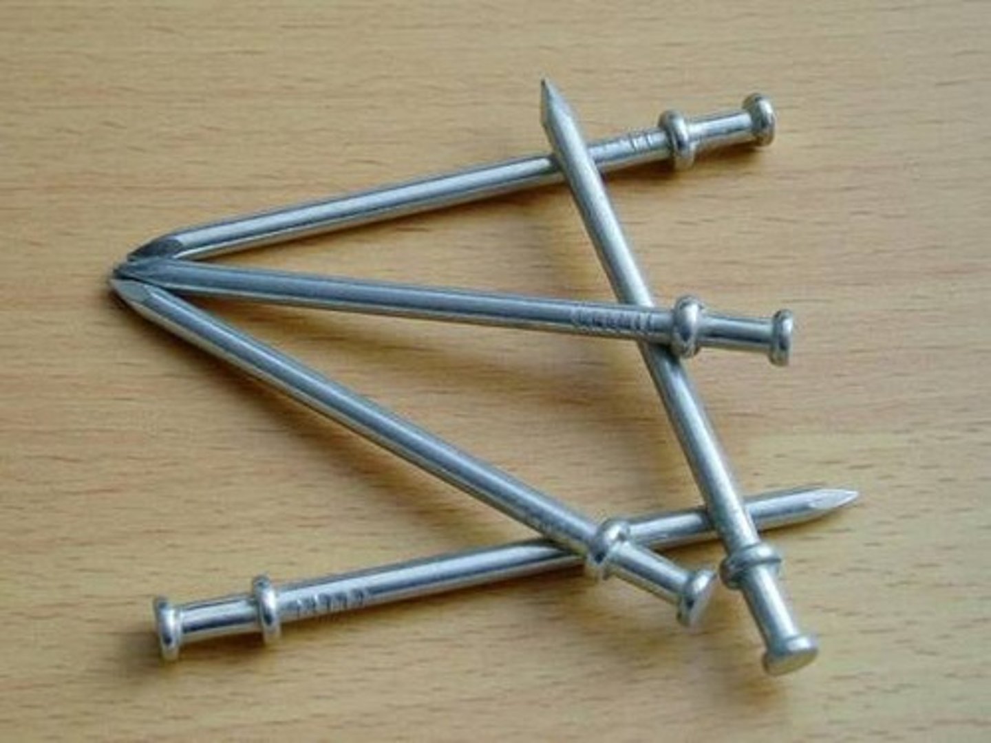 <p>has two heads and for nailing temporary structures and formworks</p>