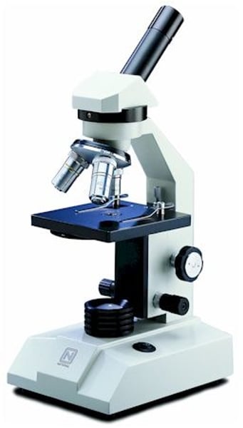 <p>Microscope that uses a beam of light passing through one or more lenses to magnify an object</p>