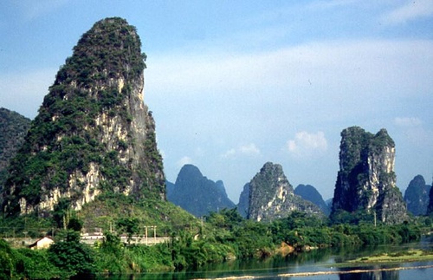 <p>a region underlain by caves in limestone bedrock; the collapse of the caves creates a landscape of sinkholes separated by higher topography, or of limestone spires separated by low areas</p>