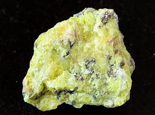 nonmetallic, yellow-white streak, same strength as fingernail